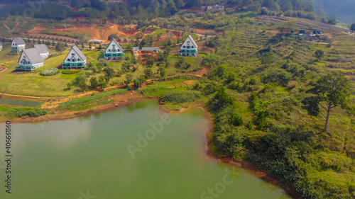 Aerial view of a small, beautiful and quiet European style villas resort on the bank of Tuyen Lam lake, Dalat, Vietnam