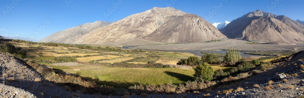 Fototapeta premium Fields Panj river Wakhan corridor Hindukush mountains