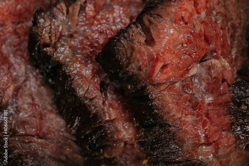 Stack of grilled teasty steak close up