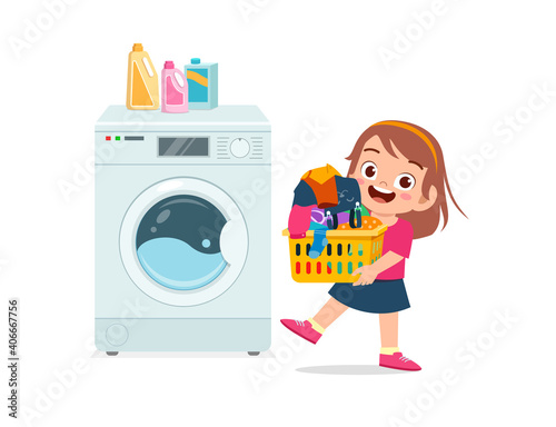 happy cute kid do laundry with washing machine