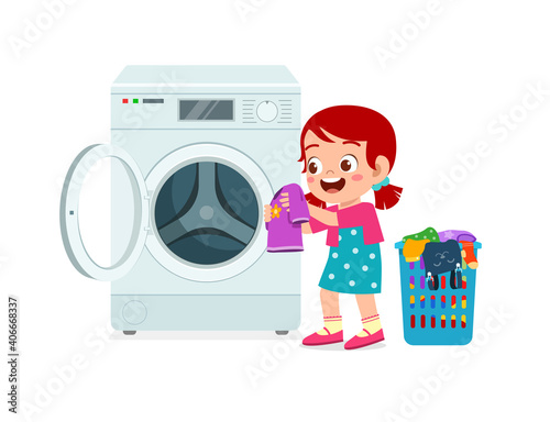 happy cute kid do laundry with washing machine
