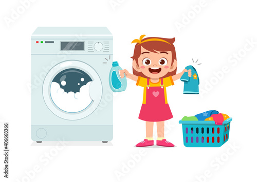 happy cute kid do laundry with washing machine