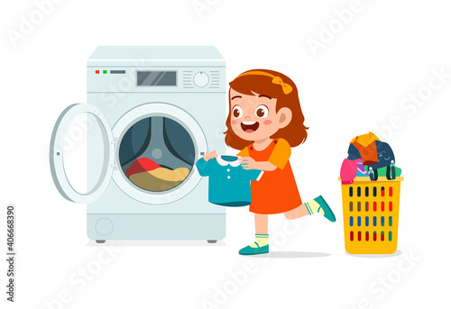 happy cute kid do laundry with washing machine