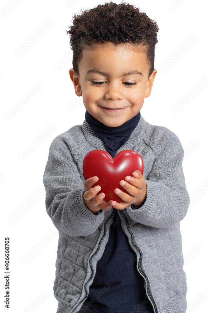 Cute afro american boy holding red heart in hands. Cute afro american boy holding red heart in hands.