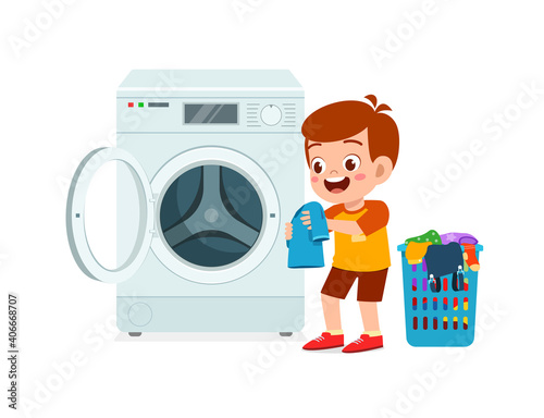 happy cute kid do laundry with washing machine