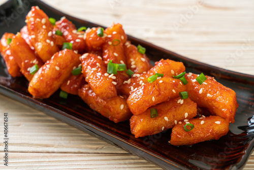 deep fried Korean rice cake (Tteokbokki) skewered with spicy sauce photo