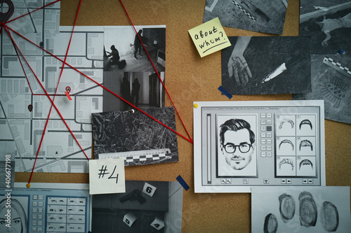 Detective board with fingerprints, crime scene photos and red threads, closeup