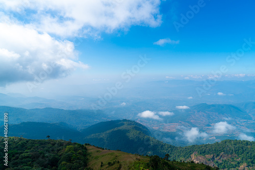 beautiful mountain layer with clouds and blue sky © topntp