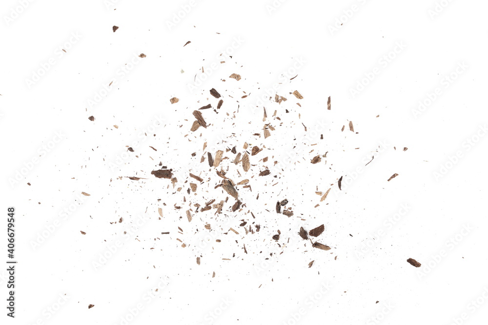 Wood pieces and dust, crushed tree bark isolated on white background, organic texture, top view