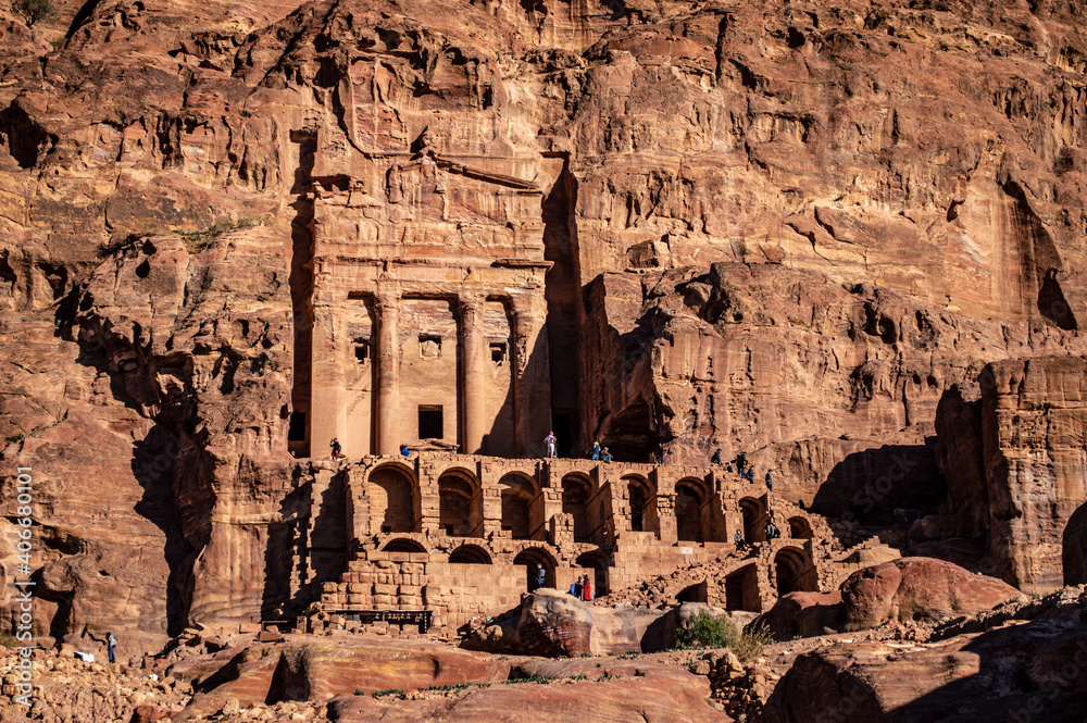 Petra, Jordan - January 6, 2020: Tourists explore the tombs and caves of the ancient city of Petra in Jordan