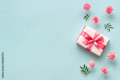 Valentines Day wedding or birthday background with pink flowers and gift boxes © 9dreamstudio