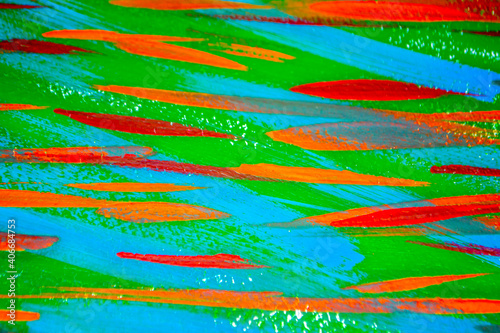 Bright varied background of colored lines of brush strokes made with paint