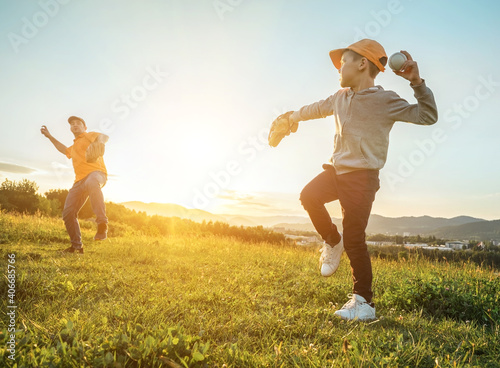 Photography Father and son playing in baseball