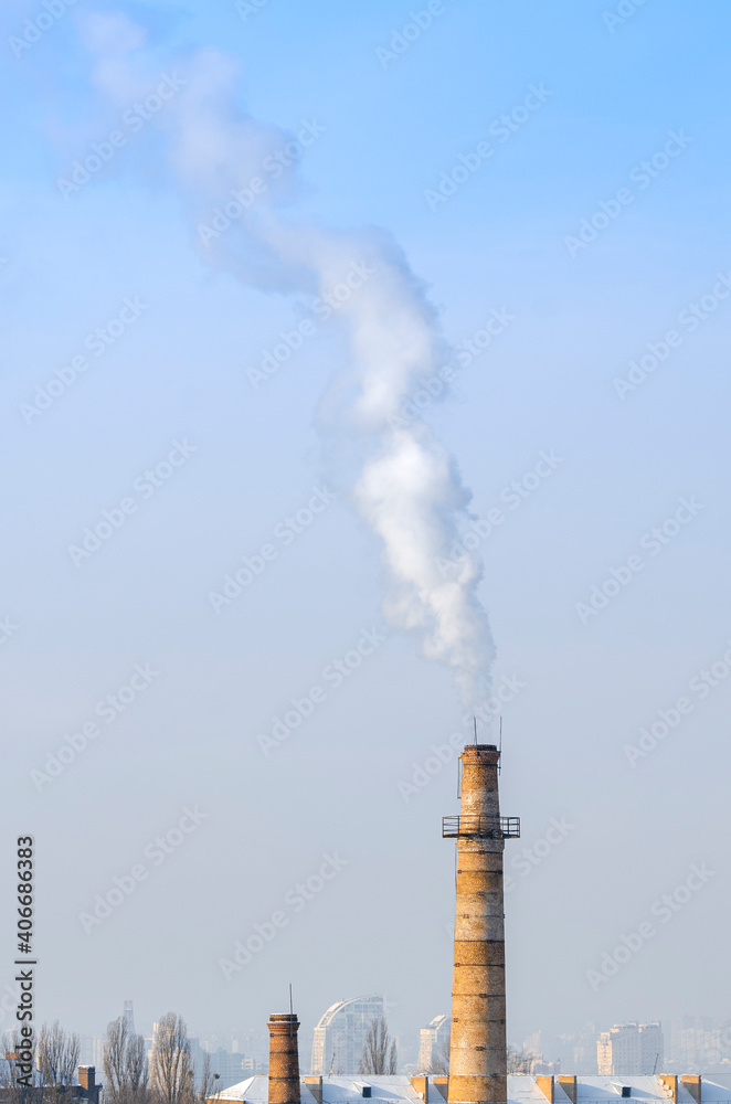 Ecology. Smoke from the chimney into the atmosphere. Pollution.