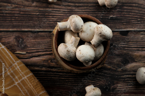 Fresh Organic Mushrooms in a wooden bowl
