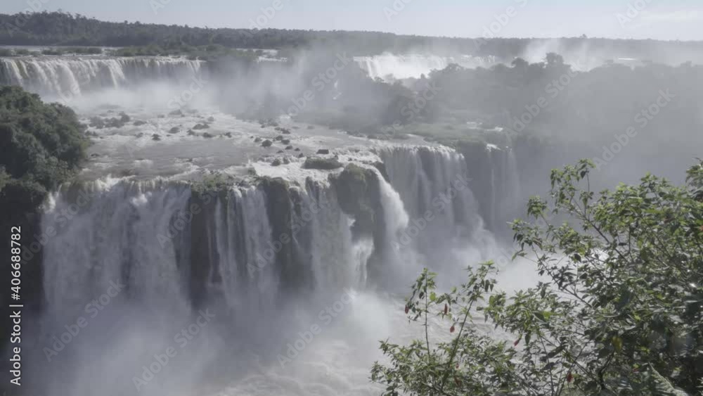 Iguazu Fa Iguazu Falls are waterfalls of the Iguazu River on the border between Argentina and Brazil. They are the largest waterfall system in the world. Iguazu Fa Iguazu Falls are waterfalls of the Iguazu River on the border between Argentina and Brazil. They are the largest waterfall system in the world.