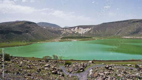 Panorama of Narligol volcanic crater lake with Geothermal field, near mountain Hassan, Cappadocia, Anatolia, Turkey photo