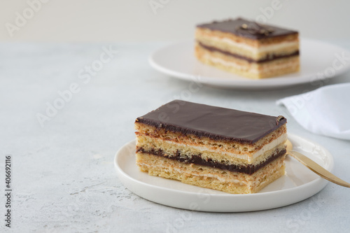 Opera cake is a type of almond sponge cake with a coffee and chocolate filling.