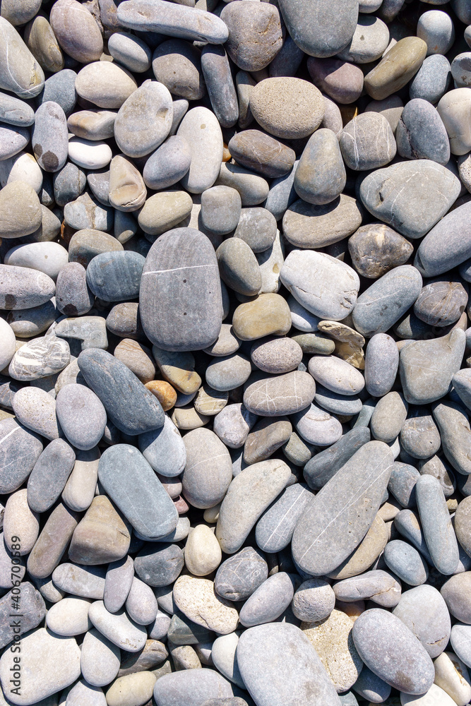 sea pebbles, natural background, texture. Sea background and beach. vertical photo sea pebbles, natural background, texture. Sea background and beach. vertical photo