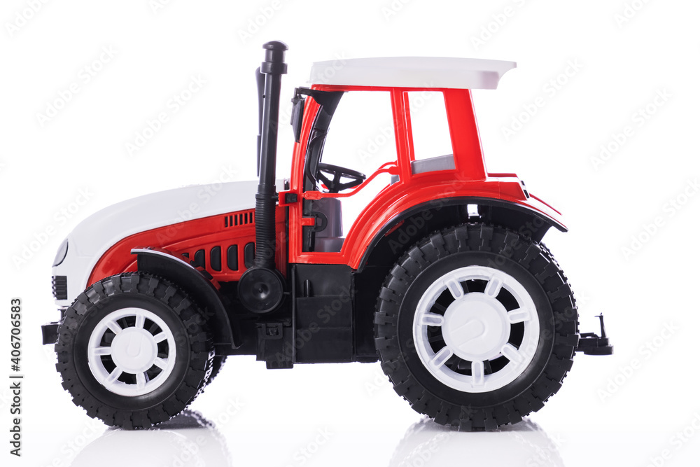 Tractor, kids toy isolated on white background Tractor, kids toy isolated on white background
