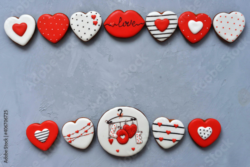 Valentine's day Homemade cookies on Ultimate Gray background, top view. Space for text. Delicious and sweet, covered with icing with a beautiful pattern gingerbread. photo