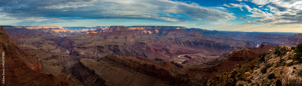 Scenic panoramic view of the Grand Canyon and the Colorado River from the Desert View viewpoint, in the Grand Canyon National Park, at sunrise, in the State of Arizona, USA Scenic panoramic view of the Grand Canyon and the Colorado River from the Desert View viewpoint, in the Grand Canyon National Park, at sunrise, in the State of Arizona, USA