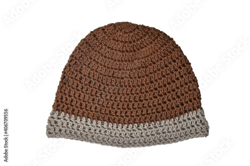 Crochet hat with knitting yarn on a white background.