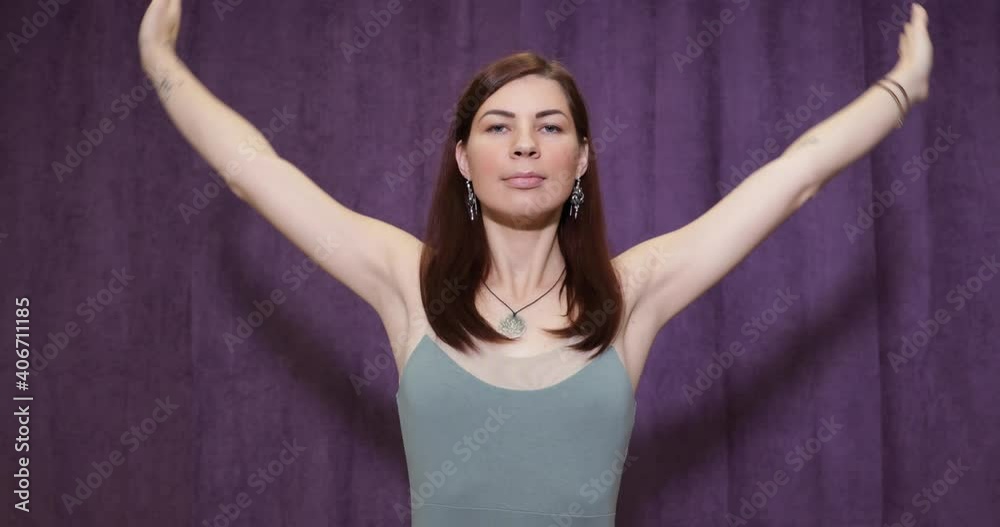 yogi woman dancing with hands and making welcome gesture yogi woman dancing with hands and making welcome gesture