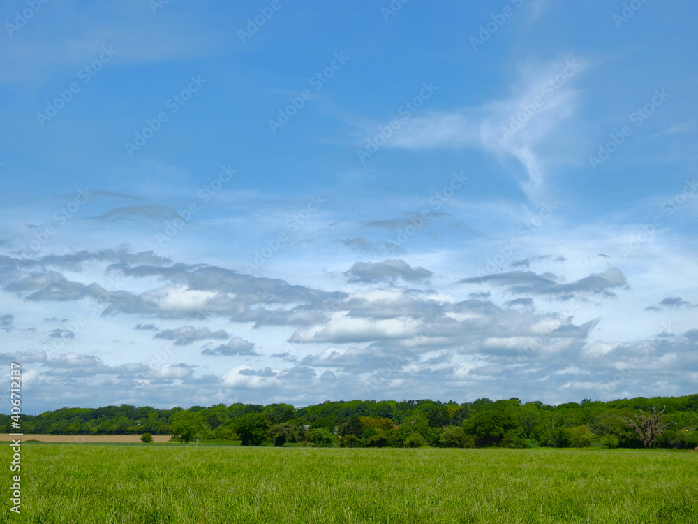 A view of the fields and various interesting clouds