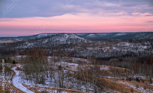 Winter sunset landscape beyond the hills © Daniel V7