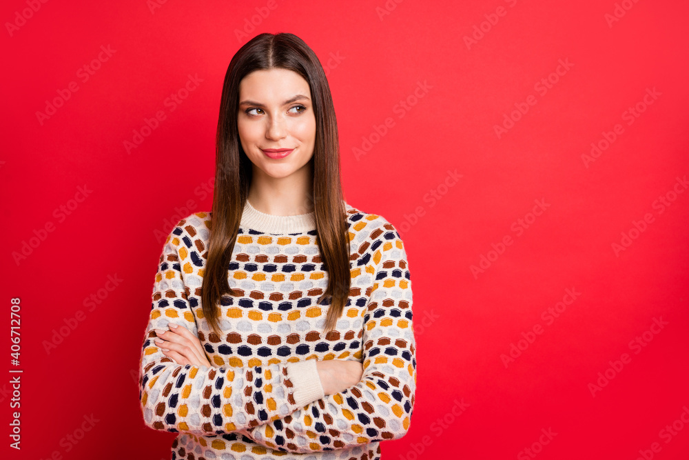 Photo portrait of curious girl looking empty space crossed hands isolated bright red color background