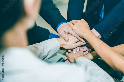Businessman group of people hand shake after the new project meeting as strength unity teamwork. Business agreement  merger and acquisitions concept.
