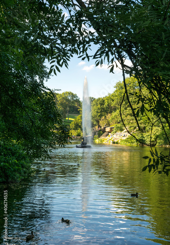  Lakes and fountains of the famous Sofievsky arboretum and walking people, in the city of Uman, Ukraine.