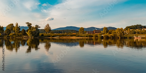 Beautiful summer view with reflections near Mettenufer, Danube, Bavaria, Germany