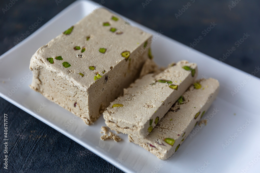 Sliced tahini halva with pistachio