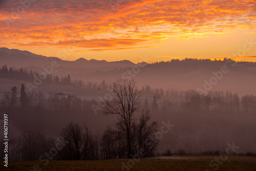 Fototapeta Naklejka Na Ścianę i Meble -   mountains during a frosty, brilliant sunrise, Tatra Mountains, Poland	