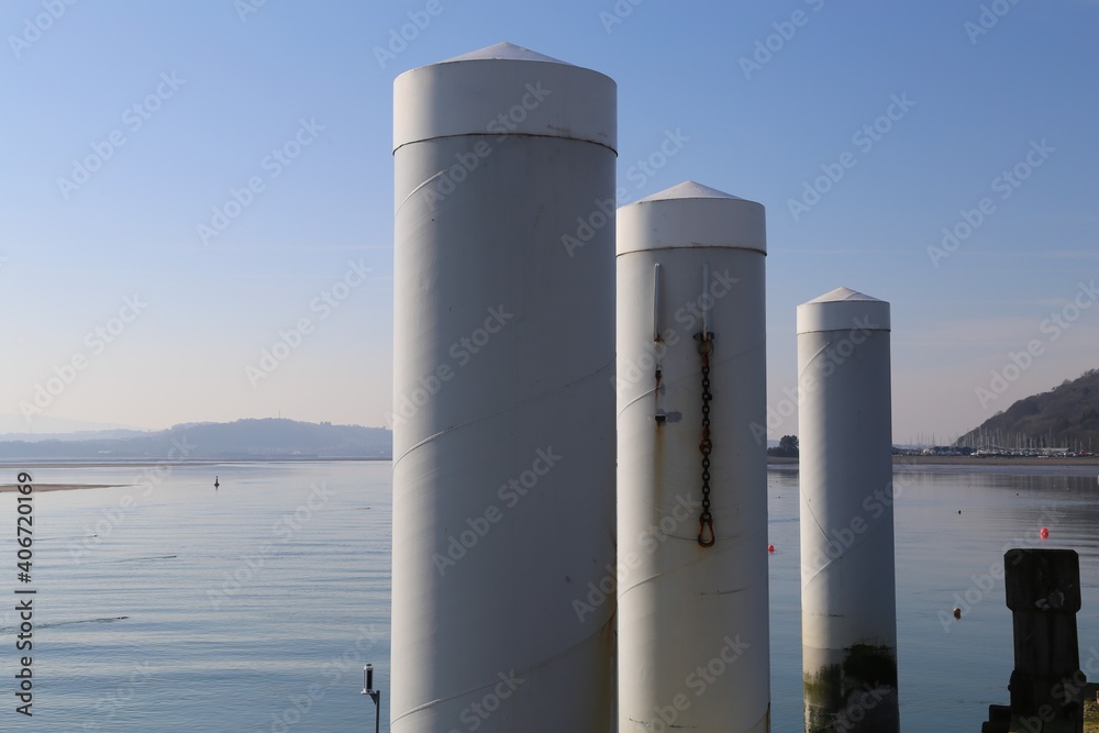 Columns associated with the floating  pontoon and landing stage at Beaumaris Pier, Isle of Anglesey, Wales, UK.