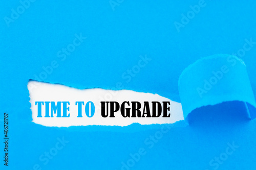 TIME TO UPGRADE written under torn paper.