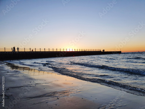 Sunset over the pier in Dubai