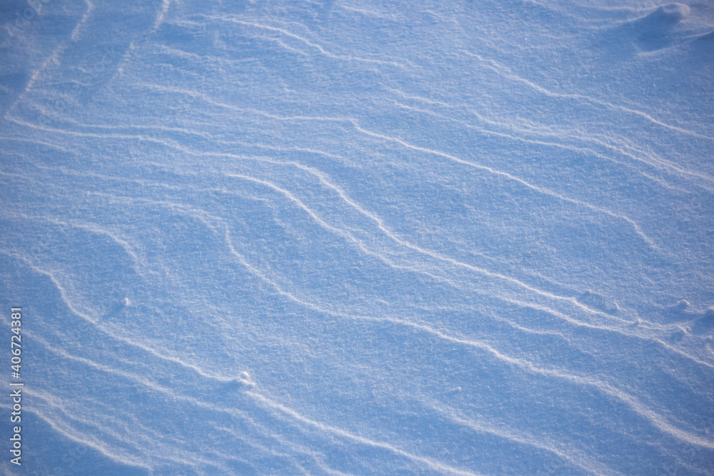Snow texture. drawing created by the wind. cold nature Snow texture. drawing created by the wind. cold nature