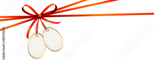 red colored ribbon bow with hang tag