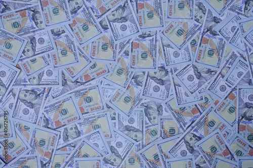 Group of money stack of 100 US dollars banknotes a lot of the background texture top view