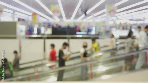 Wallpaper Mural People walk on the escalator in the mall. Torontodigital.ca