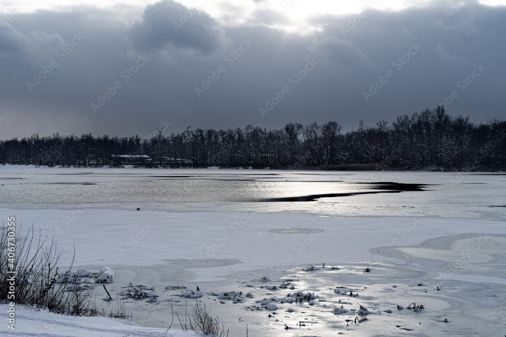 Winter landscape in Kyiv. A river and snow Winter landscape in Kyiv. A river and snow