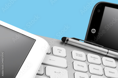 Tablet with PC keyboard and mobile photo