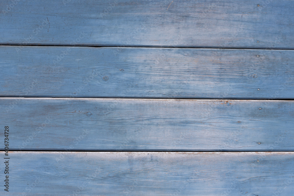 Obraz premium Old wooden background. Wood texture with a shabby blue paint.