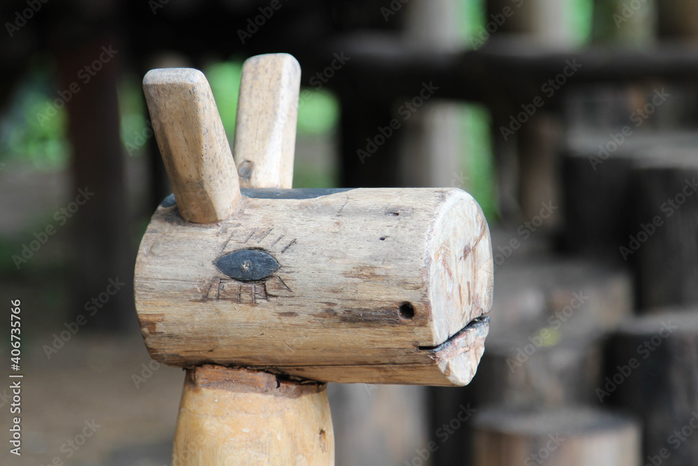 Wooden rocking horse on the ground. Wooden rocking horse on the ground.