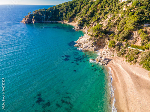 aerial images of lloret de mar virgin beach turquoise blue water without people transparent europe mediterranean sea © Osvaldo Mussi