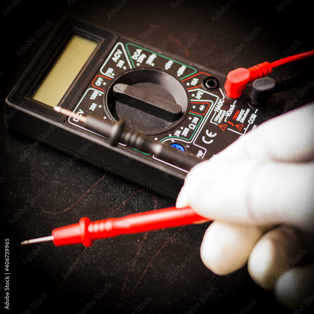 multimeter on dark background working process multimeter on dark background working process