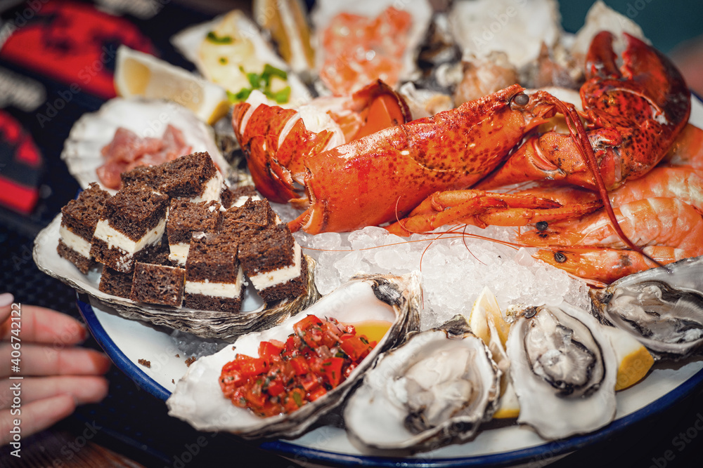 Fresh seafood plate with lobster, mussels and oysters